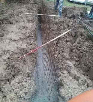 Mise en place de barrières anti-racines (Avant)