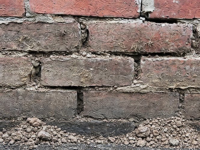 Murs briques fissures-1