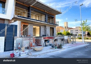 stock-photo-townhouse-under-construction-villa-and-prefab-house-under-construction-construction-of-modern-2490201073